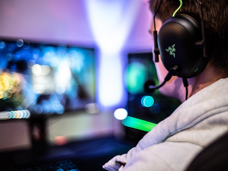 Row of glowing gaming PCs